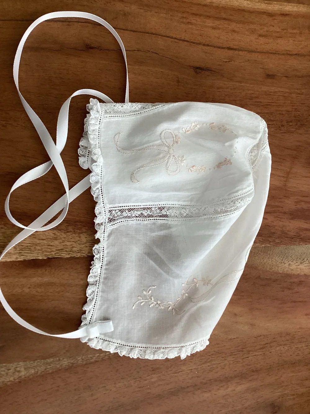 Vtg. Embroidered Bonnet with lace trim and delicate pink floral vine detail.